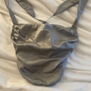 Urban Outfitters Silver corset top. Barely worn and is adjustable.